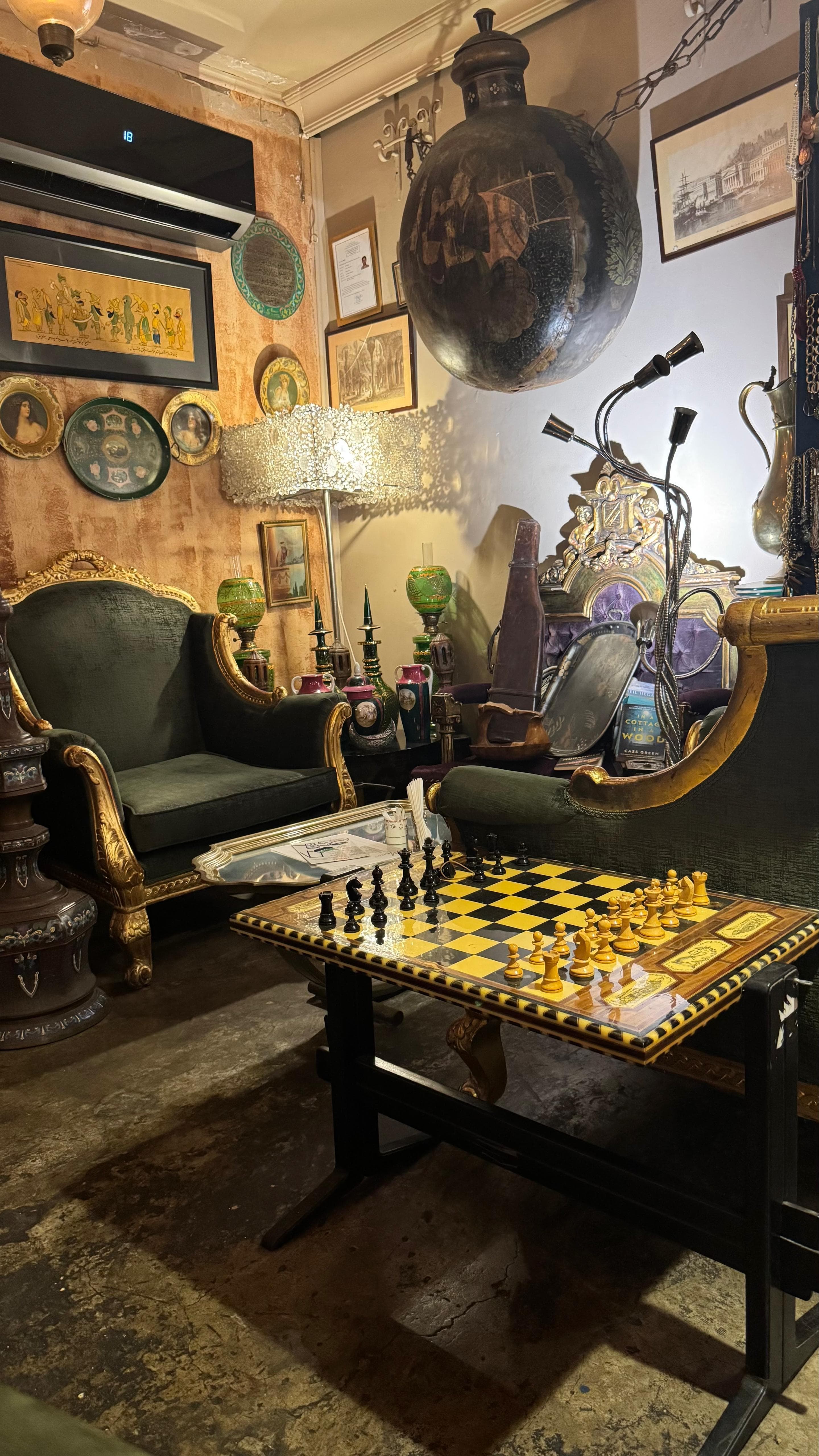 The cosy antiques-café corner at Nold Eatery, in warm golden light