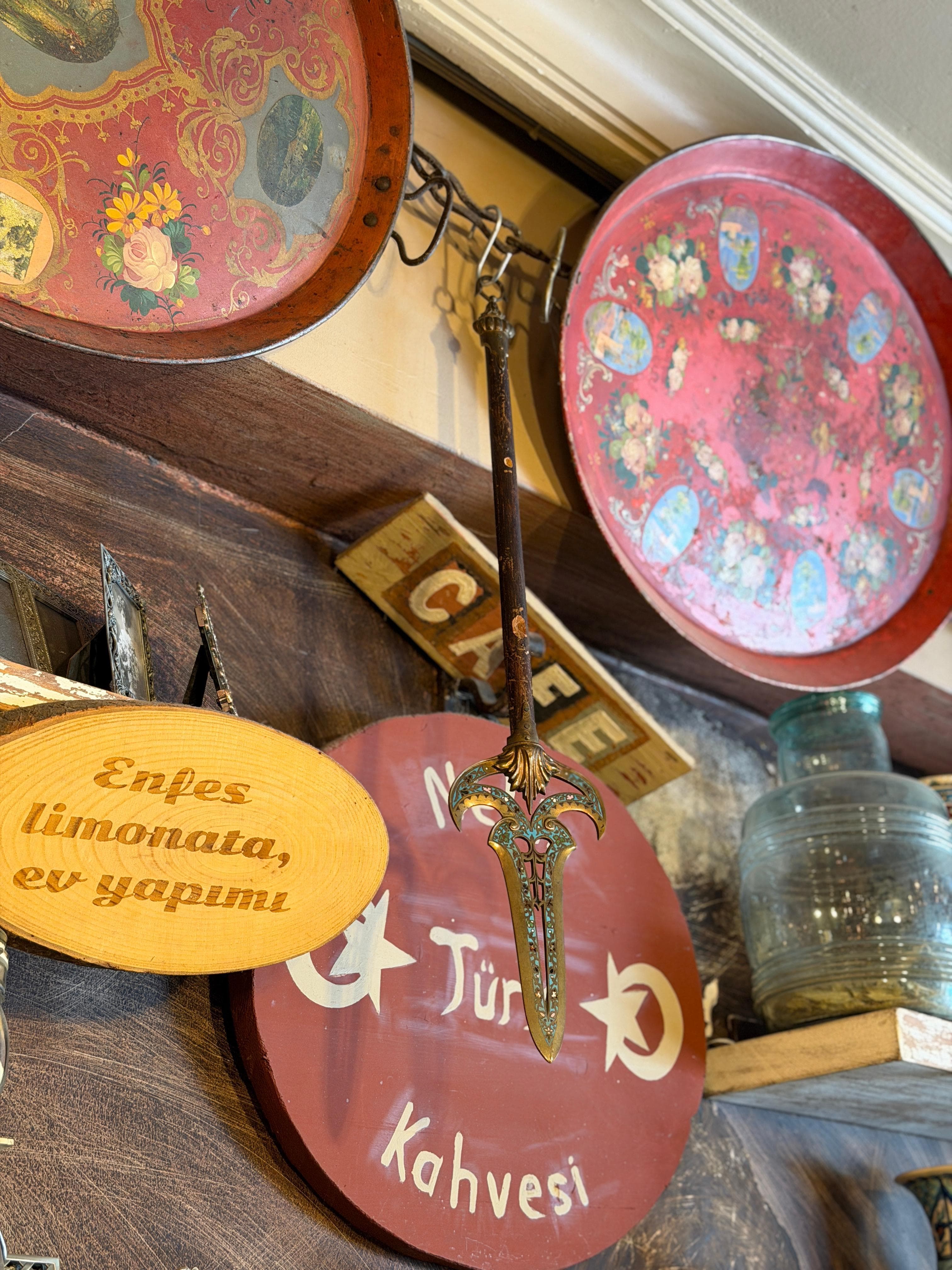 Hand-painted Turkish coffee and lemonade signs on the wall